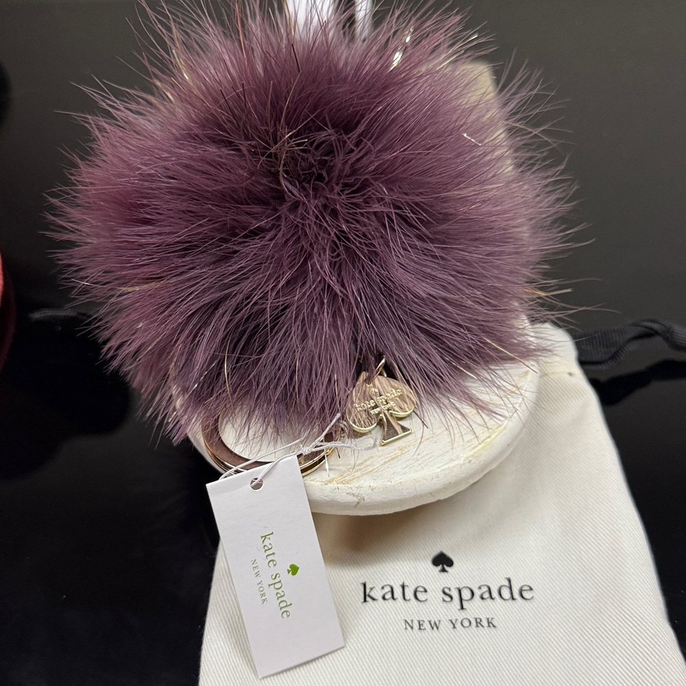 Kate Spade Plum and Gold Pom Pom Keychain or Bag Charm. NWT.